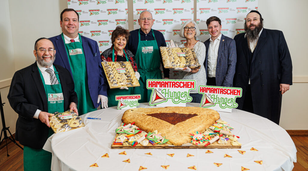 A kosher food bank unveils 50-pound Purim cookie to raise awareness about hungry New Yorkers